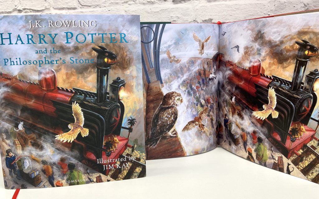 2015 Harry Potter and the Philosopher's Stone book cover and two-page illustrations by Jim Kay. Showing the Hogwarts Express on Platform Nine and Three-Quarters.
This image has been used on the design of the 2022 UK Hogwarts Express 50p.