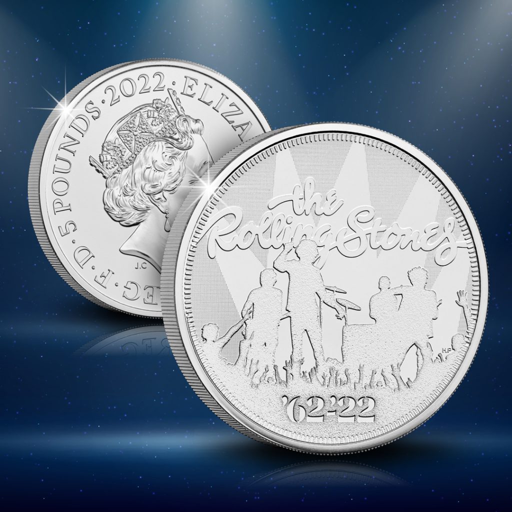 2022 UK The Rolling Stones £5 coin.
Showing reverse in front with a depiction of 4 band members, with stage lights shining down and 'The Rolling Stones' and '62-22' as inscriptions.
The obverse featured behind shows the fifth portrait of QEII by Jody Clark and the year-date, 2022.