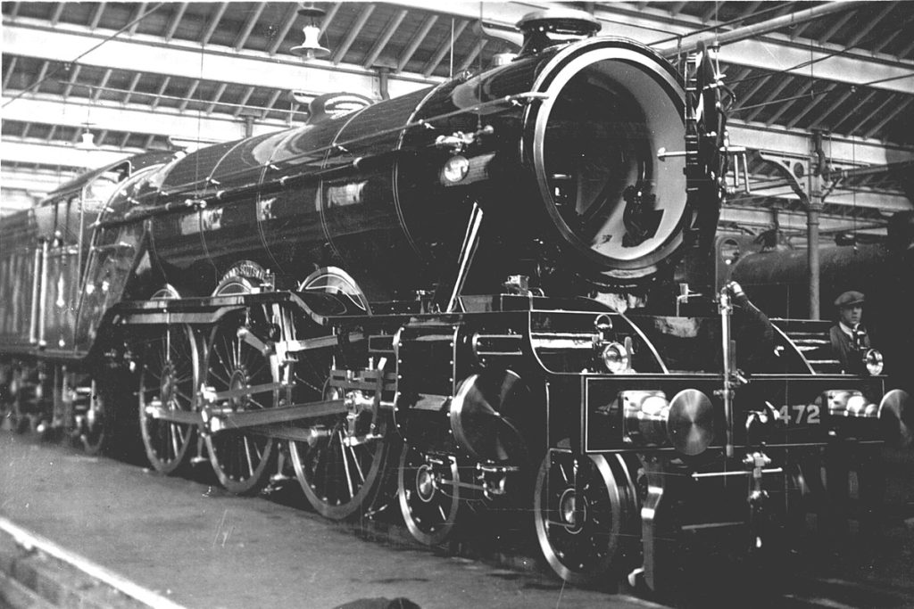 UK Flying Scotsman celebrated on new £2 coin.
Black and white image shows Flying Scotsman being built in 1922 in Doncaster