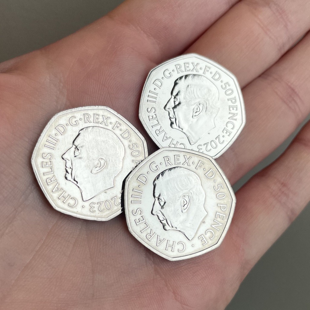 Commemorative 50p coin obverses featuring King Charles III